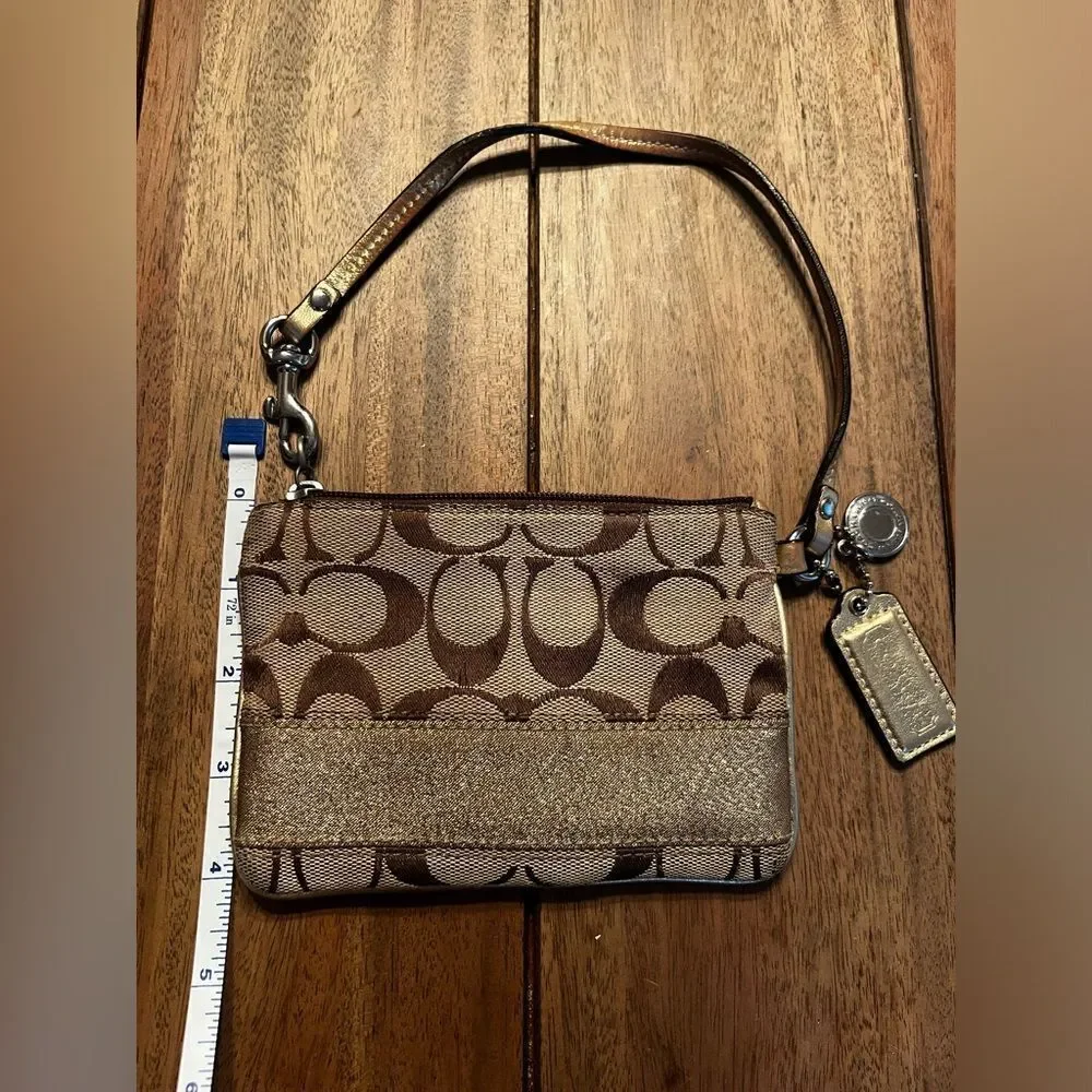 Coach Brown and Tan Signature Wristlet with gold stripe. Vintage 4x6 inches